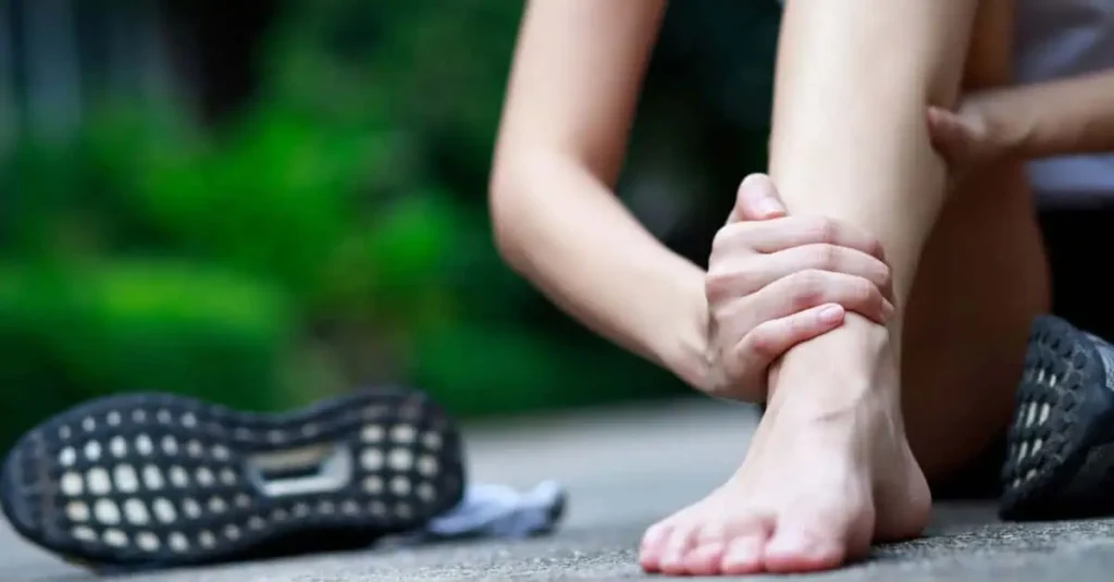 Man massaging his ankle due to poor blood circulation