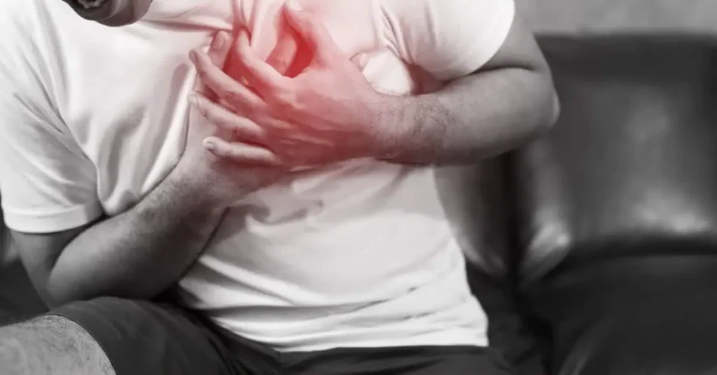 Man holding his chest due to poor blood circulation