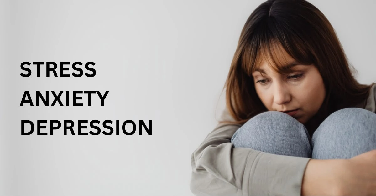 What Is the Difference Between Stress and Anxiety? Woman sitting and appearing stressed and depressed