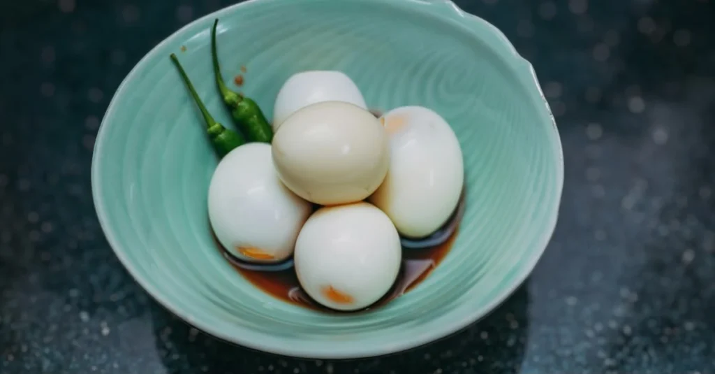 How to develop healthy eating habits: A bowl of boiled peeled eggs and bell peppers for developing healthy eating habits