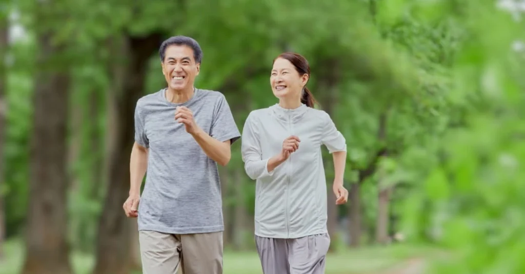 Couple enjoying a brisk walk to experience the benefits of physical activity